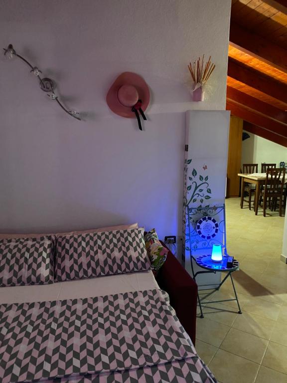Postel nebo postele na pokoji v ubytování B&B Su Canistreddu
