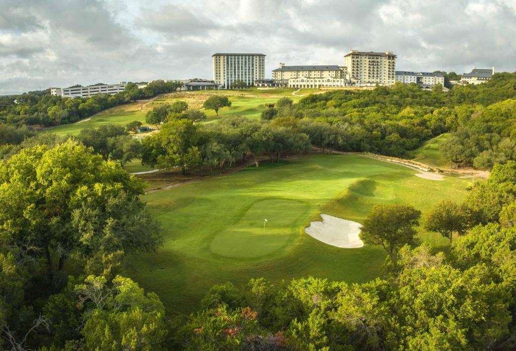 an aerial view of a golf course with a green at Omni Barton Creek Resort and Spa Austin in Austin