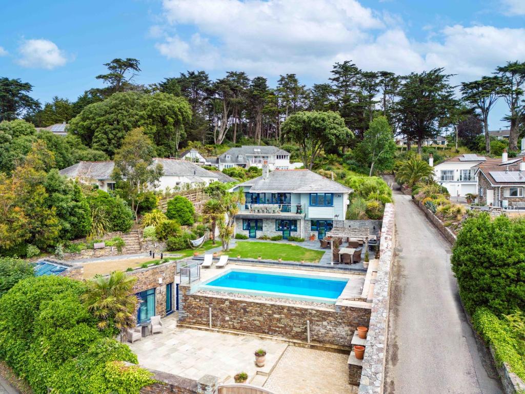 an aerial view of a house with a swimming pool at Camel Point in Wadebridge