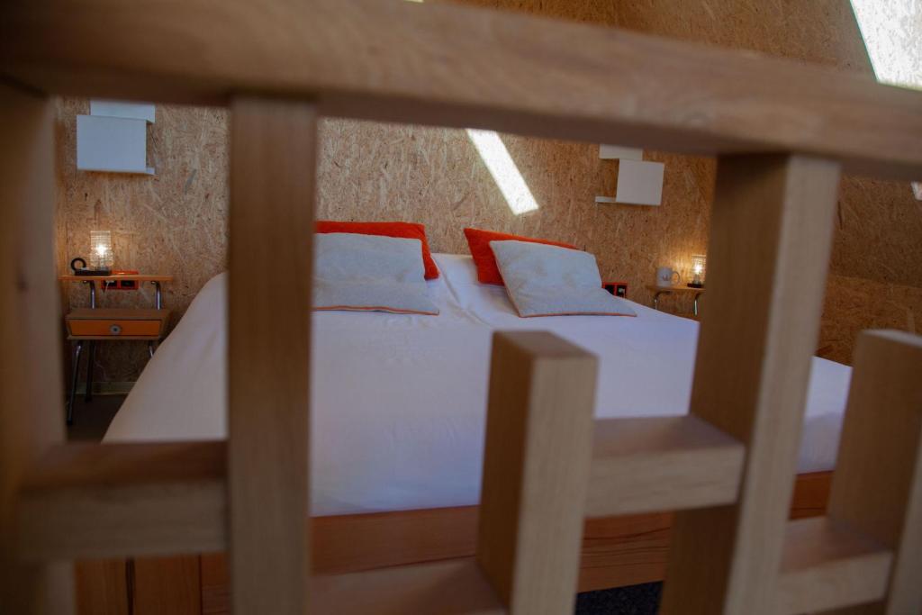Postel nebo postele na pokoji v ubytování Silver Garden
