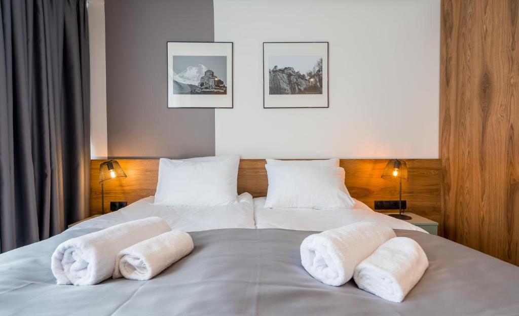 Postel nebo postele na pokoji v ubytování Step Inn - Kazbegi