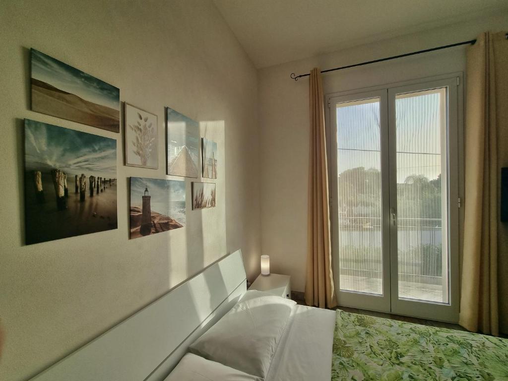 Posteľ alebo postele v izbe v ubytovaní Al Vecchio Carrubo - Lovely 2-rooms house & patio