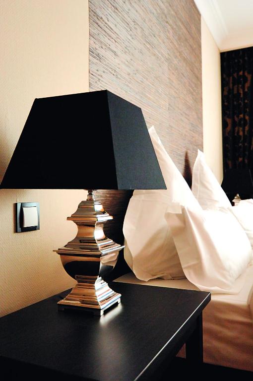 Postel nebo postele na pokoji v ubytování Hotel Business & More