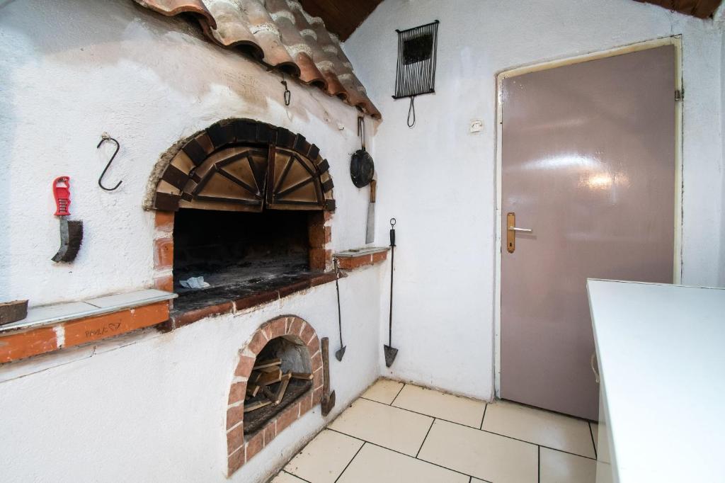 Kuchyň nebo kuchyňský kout v ubytování Apartment Ivan Vrsi