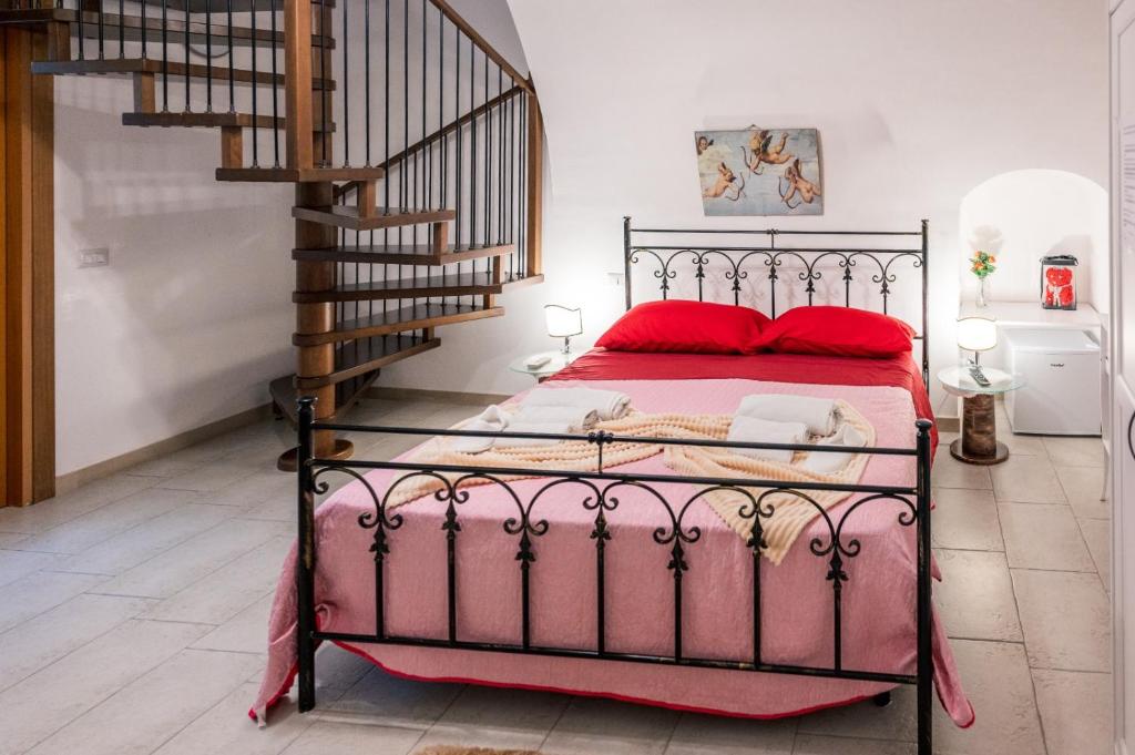 Postel nebo postele na pokoji v ubytování Il Borgo Antico B & B