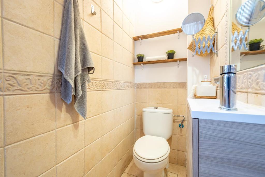 Koupelna v ubytování Acogedor apartamento en Serrallo