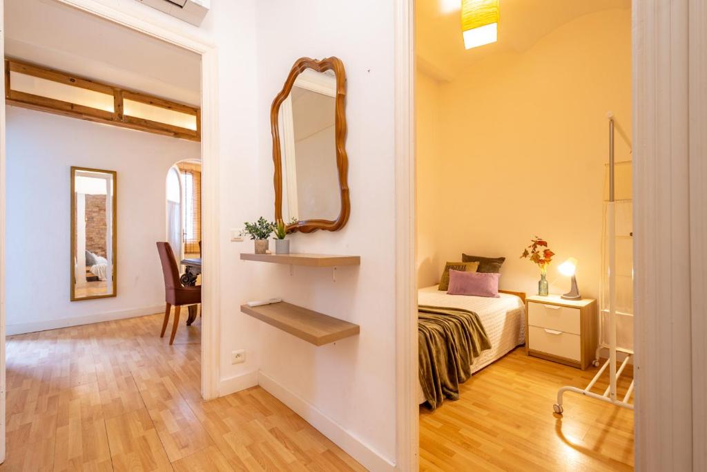 Postel nebo postele na pokoji v ubytování Acogedor apartamento en Serrallo