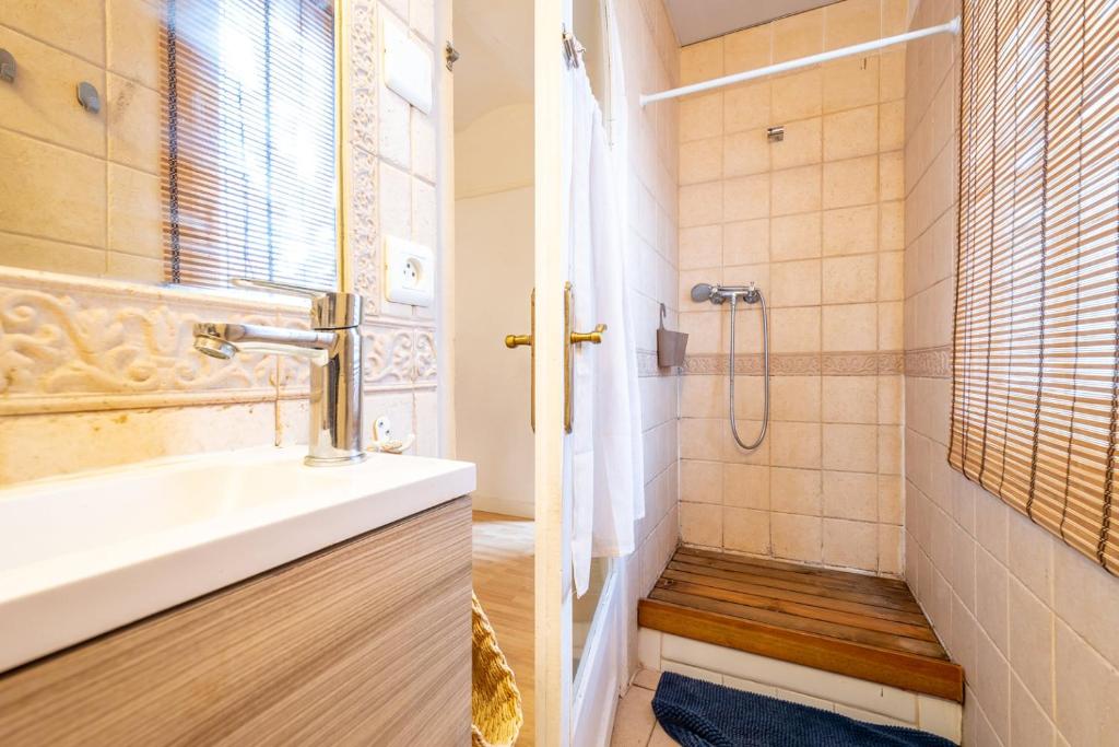 Koupelna v ubytování Acogedor apartamento en Serrallo