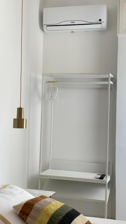 Postel nebo postele na pokoji v ubytování Settimo cielo suite