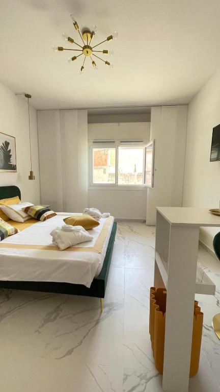 Postel nebo postele na pokoji v ubytování Settimo cielo suite