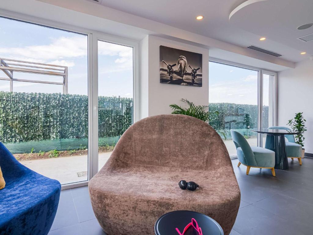 Posezení v ubytování Ibis Styles Bucharest Airport
