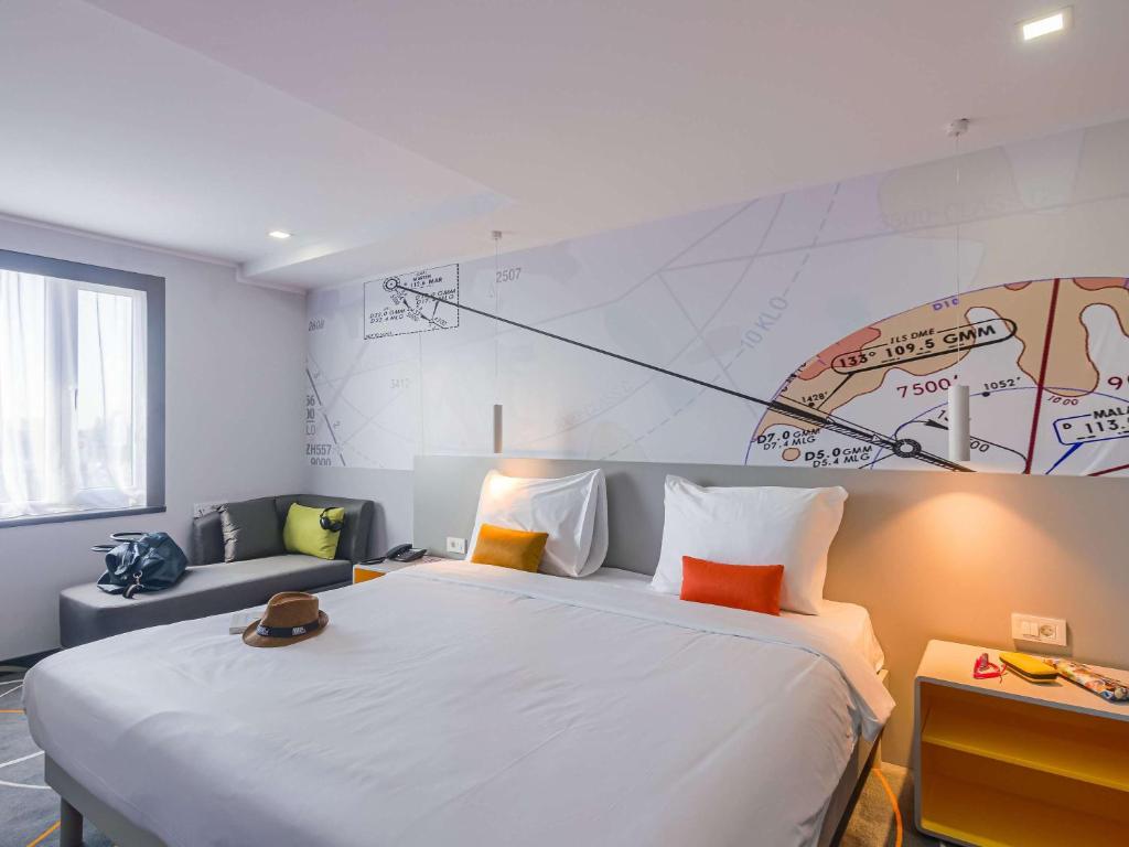 Postel nebo postele na pokoji v ubytování Ibis Styles Bucharest Airport