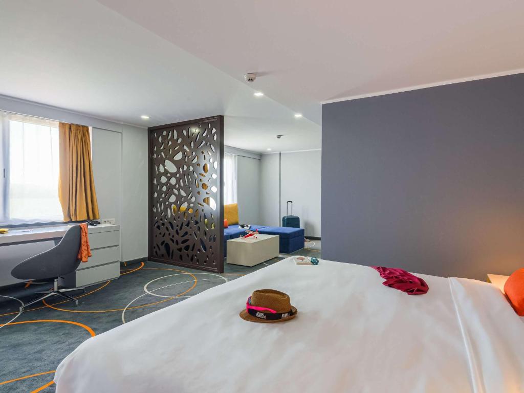 Postel nebo postele na pokoji v ubytování Ibis Styles Bucharest Airport