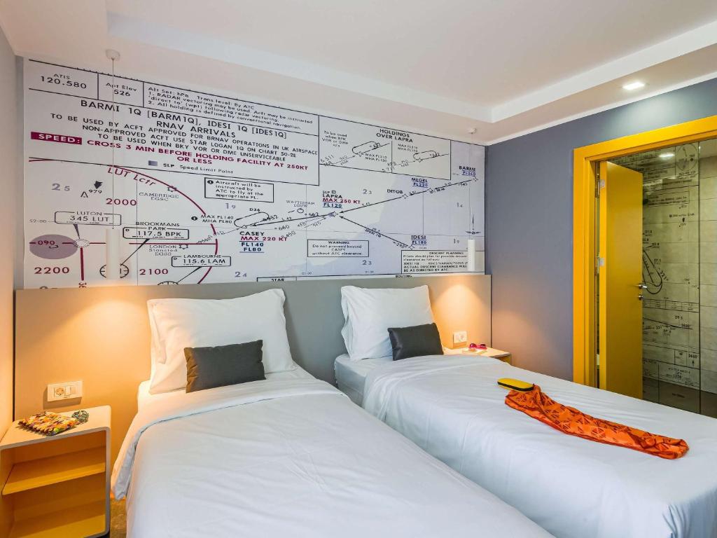 Postel nebo postele na pokoji v ubytování Ibis Styles Bucharest Airport