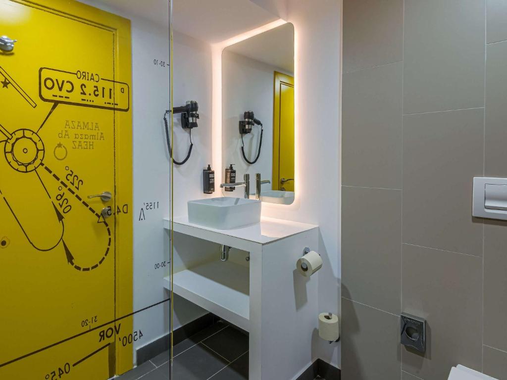 Koupelna v ubytování Ibis Styles Bucharest Airport