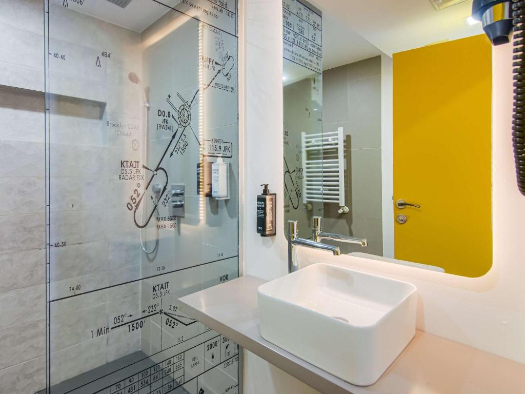 Koupelna v ubytování Ibis Styles Bucharest Airport