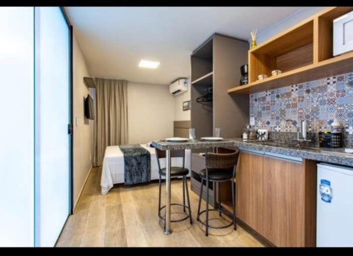Kuchyň nebo kuchyňský kout v ubytování Villa de Assis Suítes