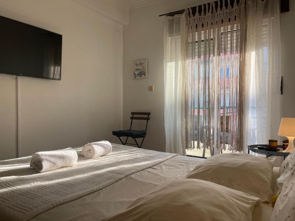 Postel nebo postele na pokoji v ubytování BestHomeStay- Caparica Beach Lisbon