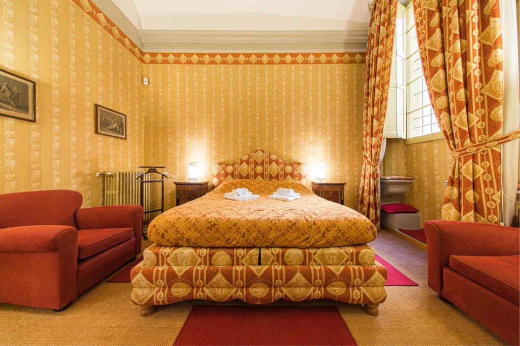 Кровать или кровати в номере Lussuoso appartamento nel cuore di Bologna