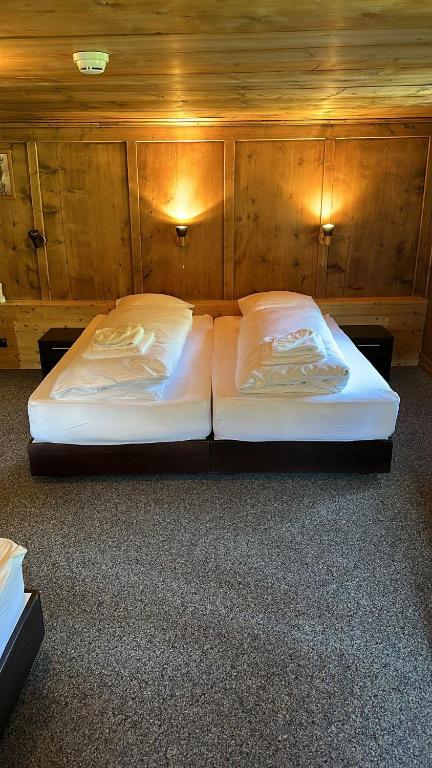 Postel nebo postele na pokoji v ubytování Hotel Tschuggen Davos