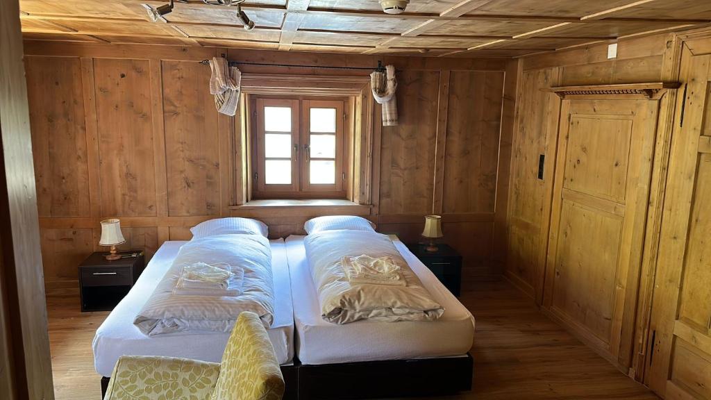 Postel nebo postele na pokoji v ubytování Hotel Tschuggen Davos