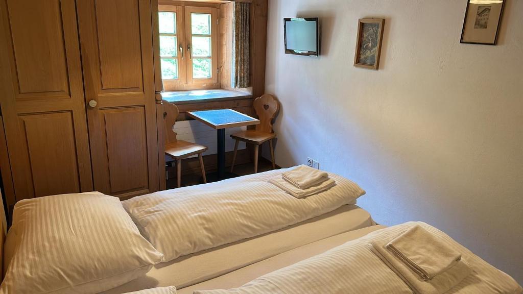 Postel nebo postele na pokoji v ubytování Hotel Tschuggen Davos