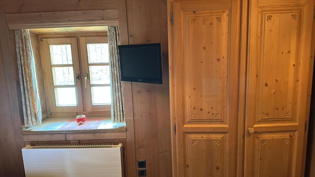 TV a/nebo společenská místnost v ubytování Hotel Tschuggen Davos