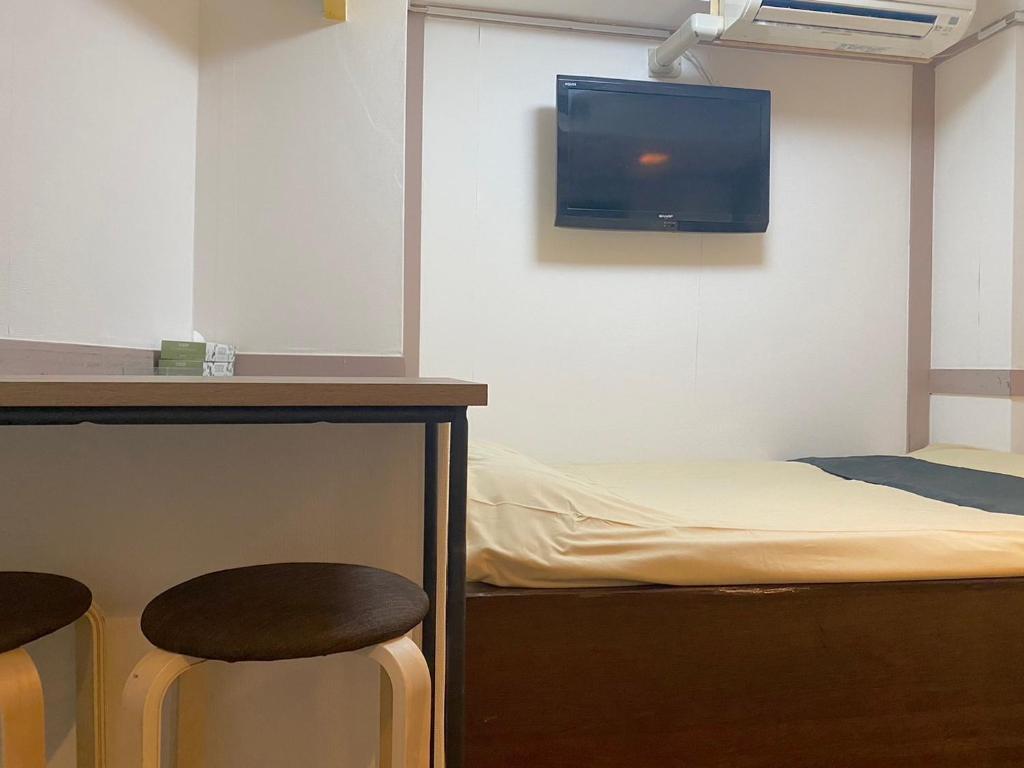 TV a/nebo společenská místnost v ubytování Tabist Hotel Florida Ikebukuro
