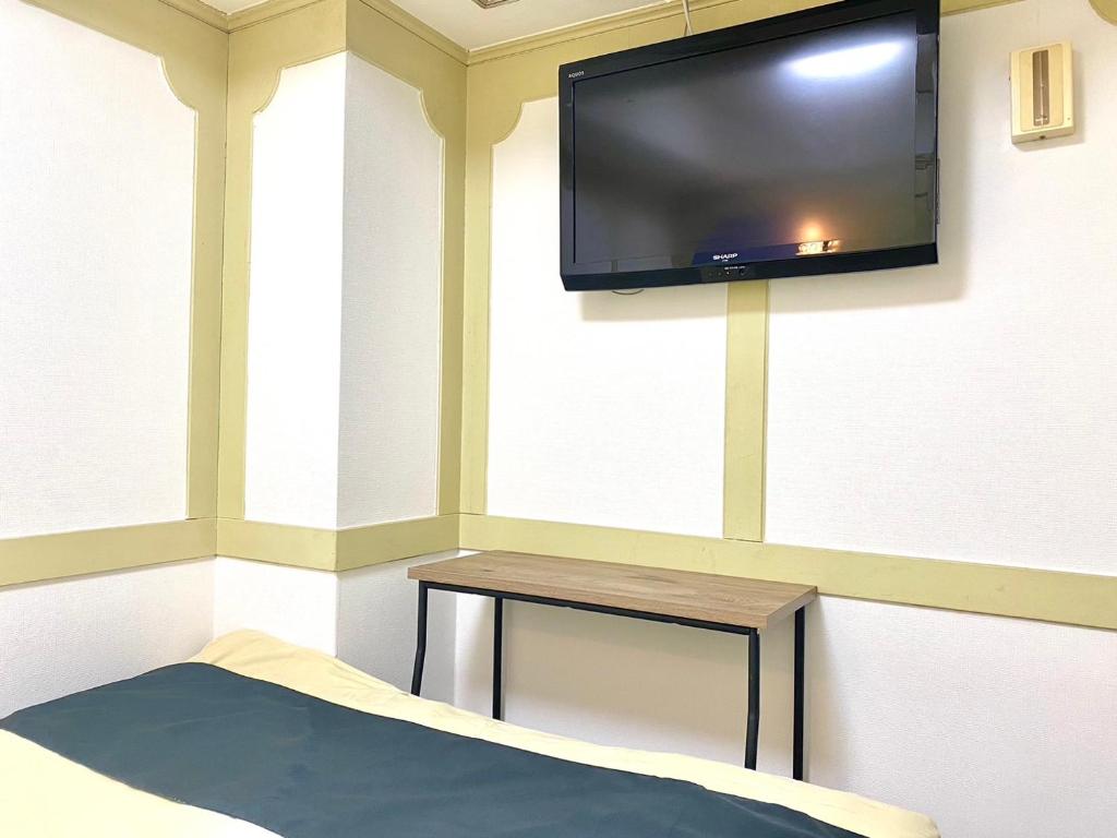 TV a/nebo společenská místnost v ubytování Tabist Hotel Florida Ikebukuro