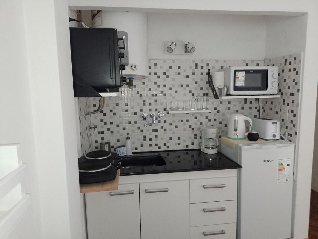 Una cocina o kitchenette en Paraná Estudio