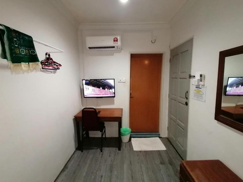 TV a/nebo společenská místnost v ubytování Mi Hotel 2 Dungun