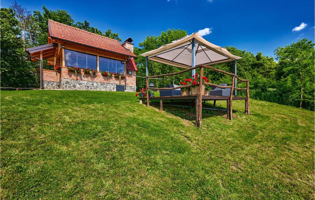 a house with a gazebo in the yard at Beautiful Home In Kraljev Vrh With Wifi in Kraljev Vrh