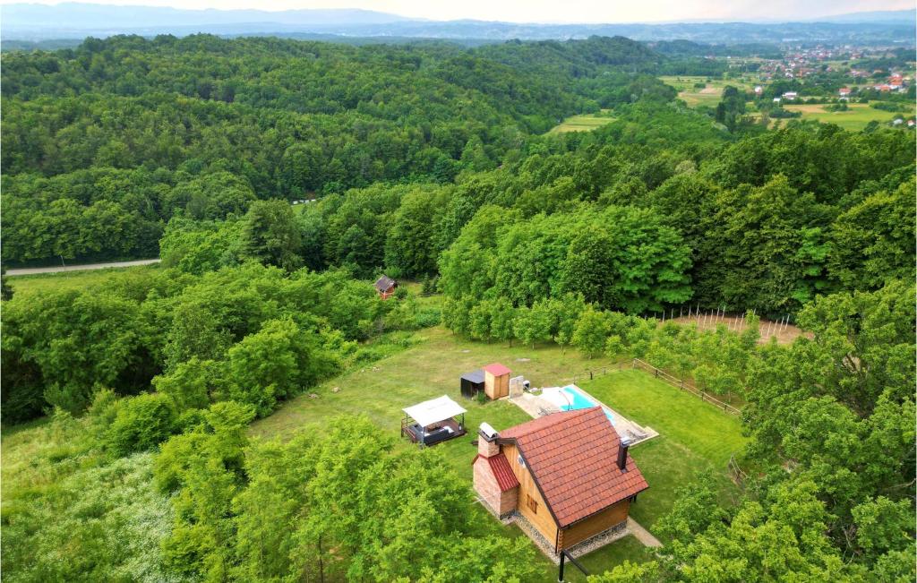 an aerial view of a house on a hill with trees at Beautiful Home In Kraljev Vrh With Wifi in Kraljev Vrh