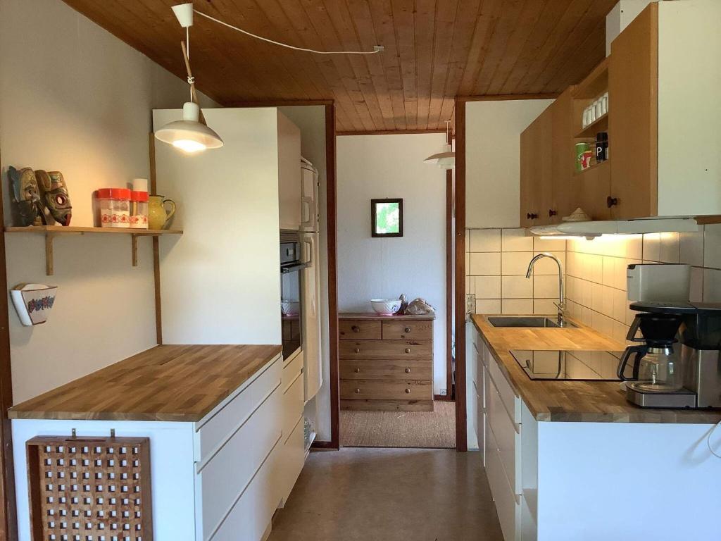 Kuchyň nebo kuchyňský kout v ubytování Holiday home Nykøbing Sj XI