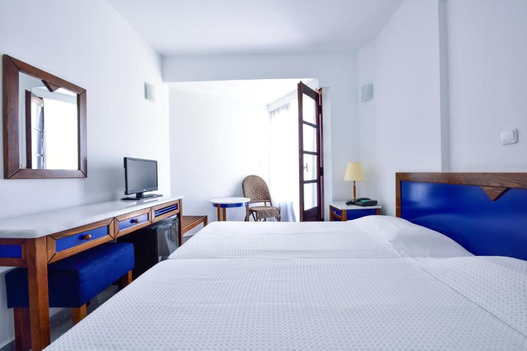 Posteľ alebo postele v izbe v ubytovaní Kalidon beach Hotel