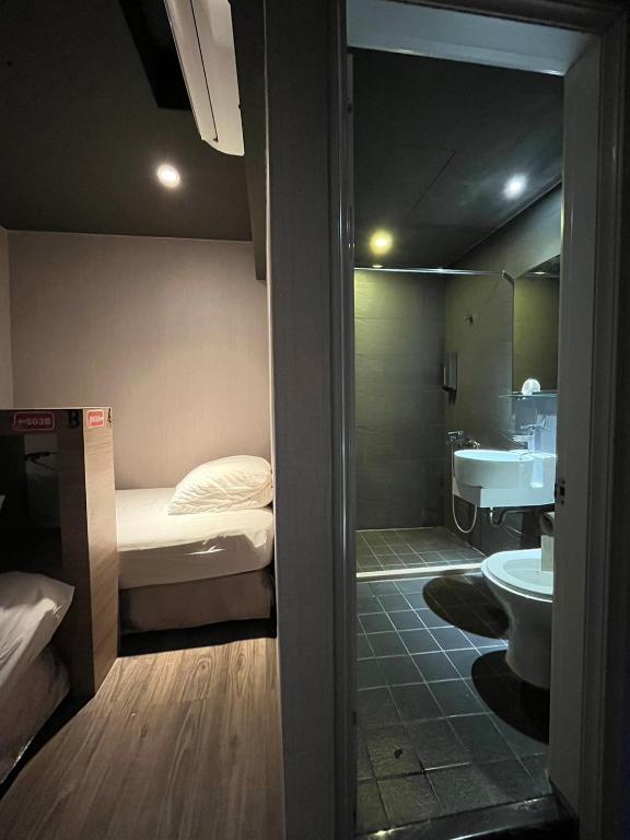 Koupelna v ubytování Main Inn Taipei