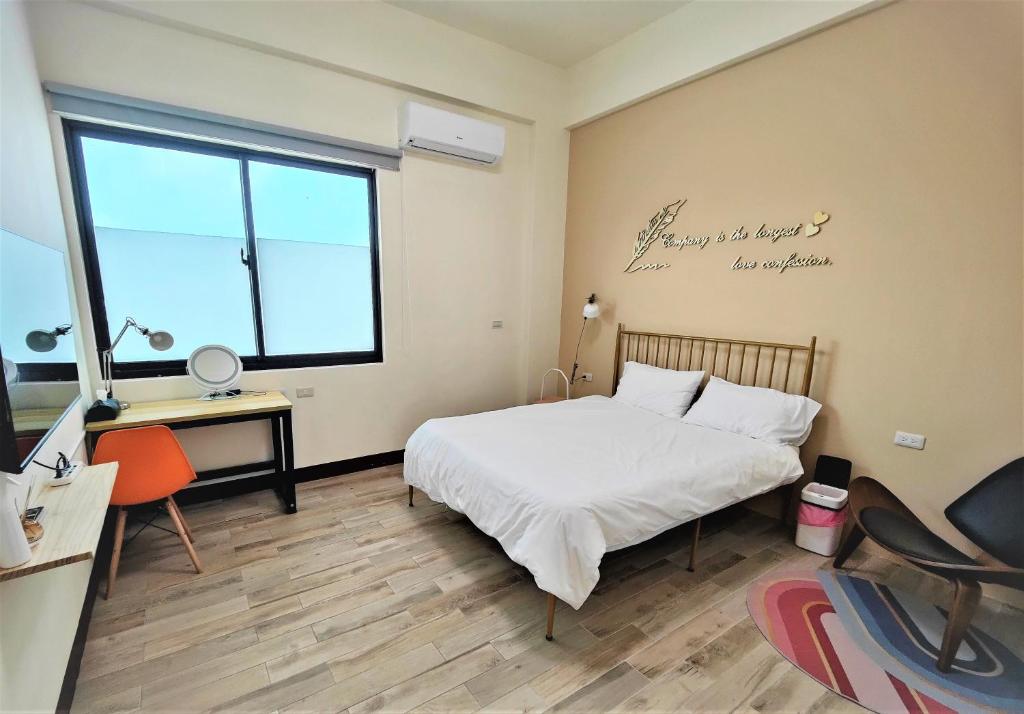Postel nebo postele na pokoji v ubytování Sofa Potato Homestay
