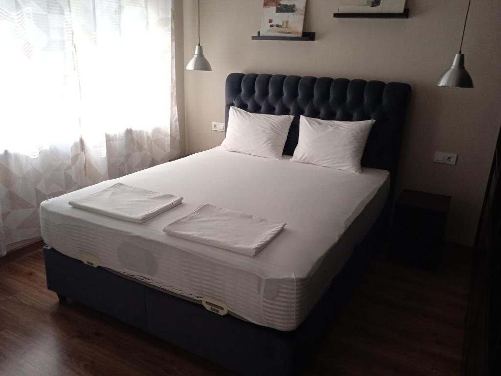 Postel nebo postele na pokoji v ubytování Draga Apartment