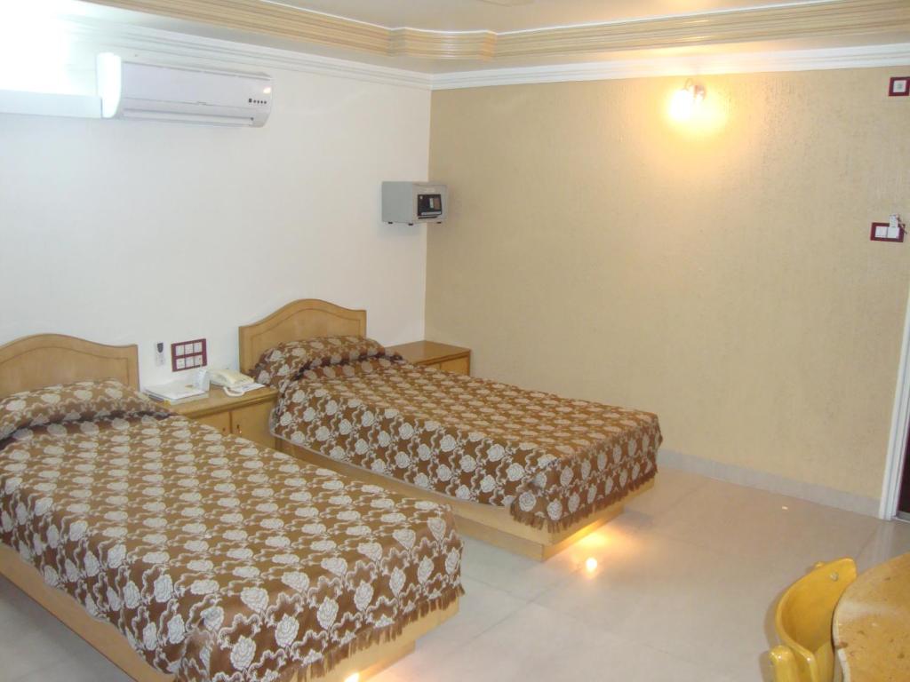 Postel nebo postele na pokoji v ubytování Hotel Swan Inn