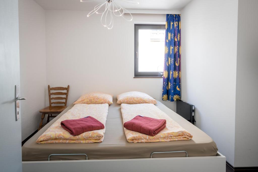 Posteľ alebo postele v izbe v ubytovaní Wohnung Seeblick