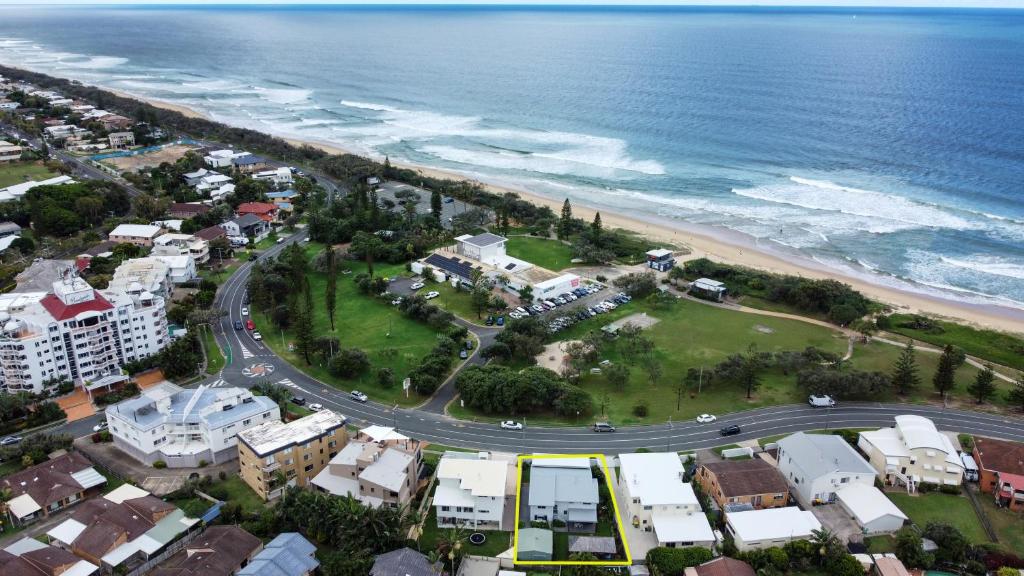 an aerial view of a city and the ocean at Stunning, Beachfront Dream Home - ZA3 in Buddina
