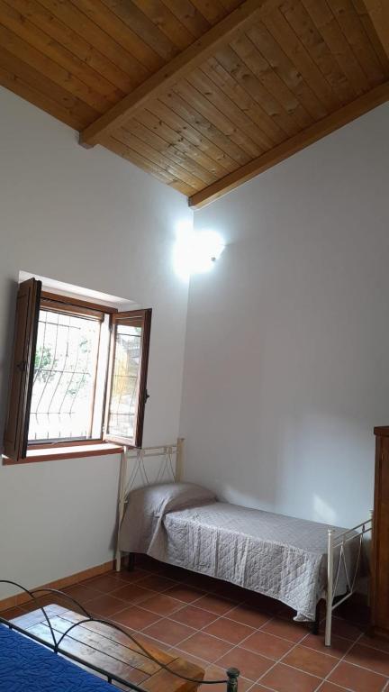 Posteľ alebo postele v izbe v ubytovaní Villa Aurora
