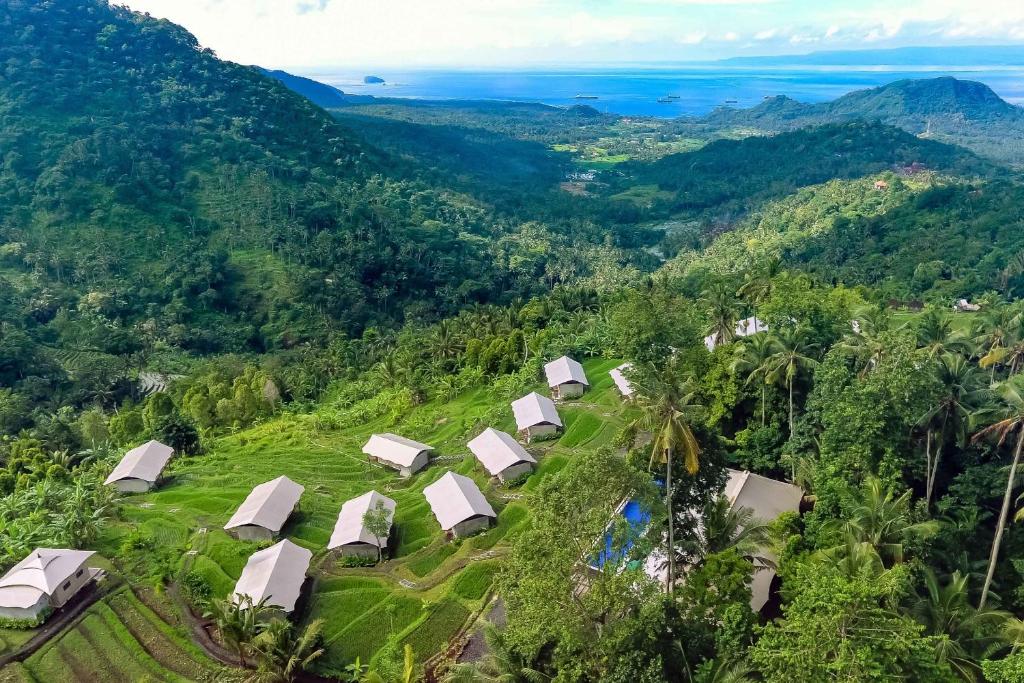 an aerial view of a resort in the mountains at Kaura Bali in Candidasa