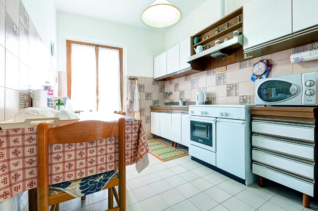 Kuchyň nebo kuchyňský kout v ubytování B&B Il Pozzo