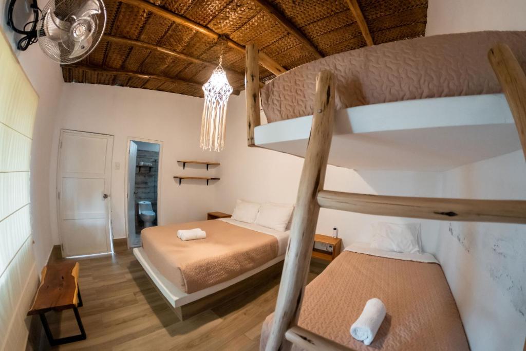 Postel nebo postele na pokoji v ubytování Hotel Boutique Beso de Sal