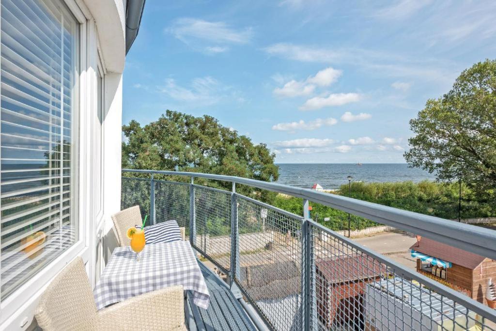 a balcony with a view of the ocean at Riviera Gdańsk Brzeźno in Gdańsk