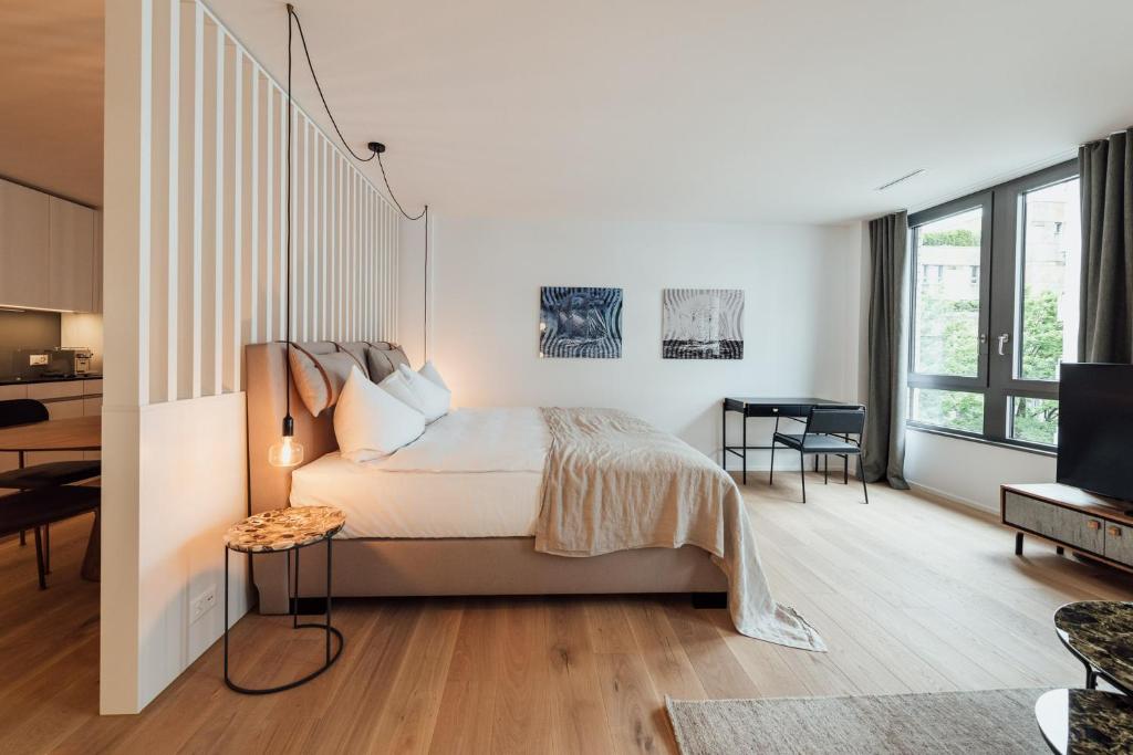 Postel nebo postele na pokoji v ubytování Gubelhof Suites