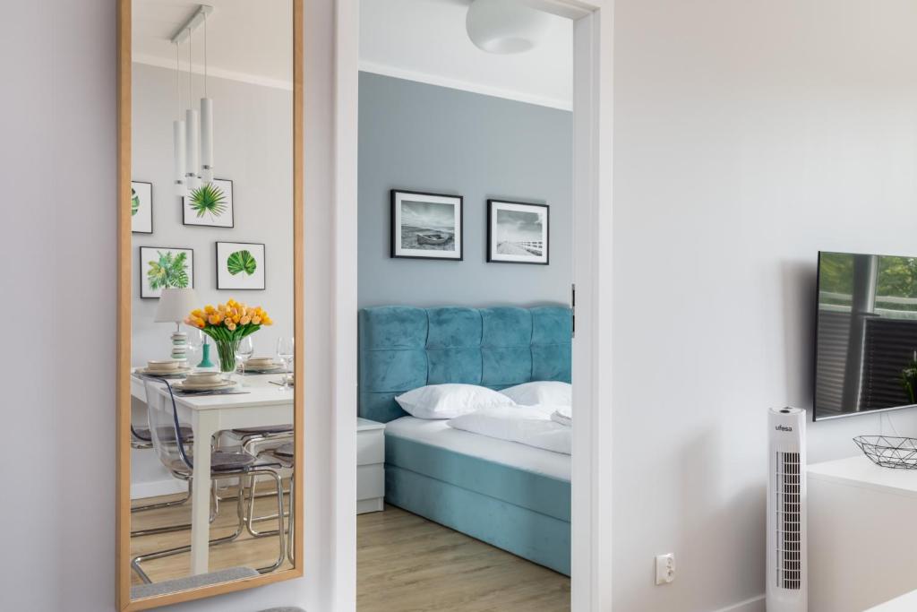 Posteľ alebo postele v izbe v ubytovaní Green Square Apartments Świnoujście by Noclegi Renters
