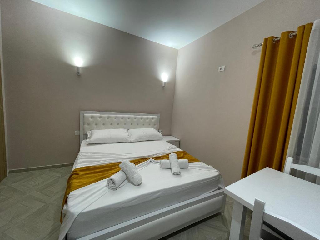 Postel nebo postele na pokoji v ubytování Vila Zini