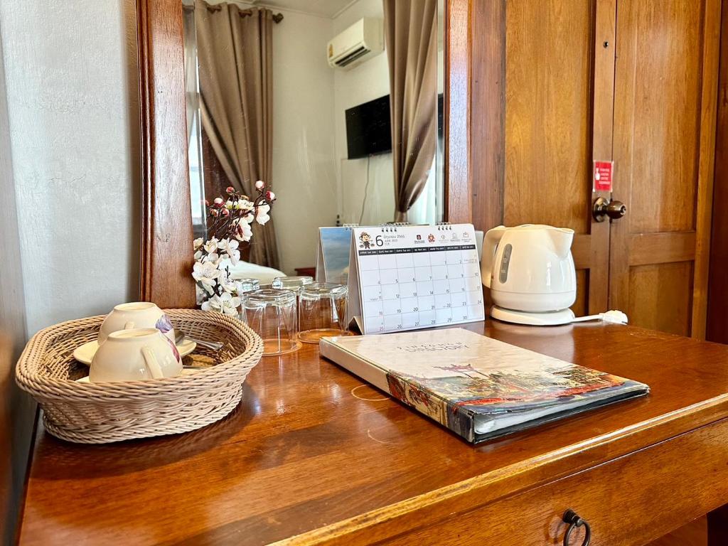 TV a/nebo společenská místnost v ubytování Dinsomon Hotel